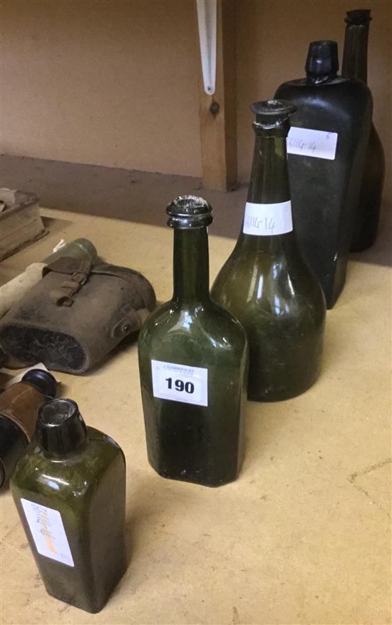 Five assorted Dutch bottles